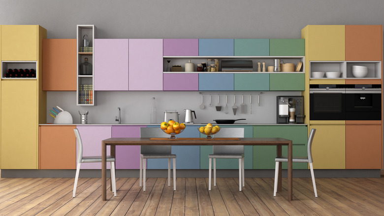 Kitchen with a variety of different cabinet colors