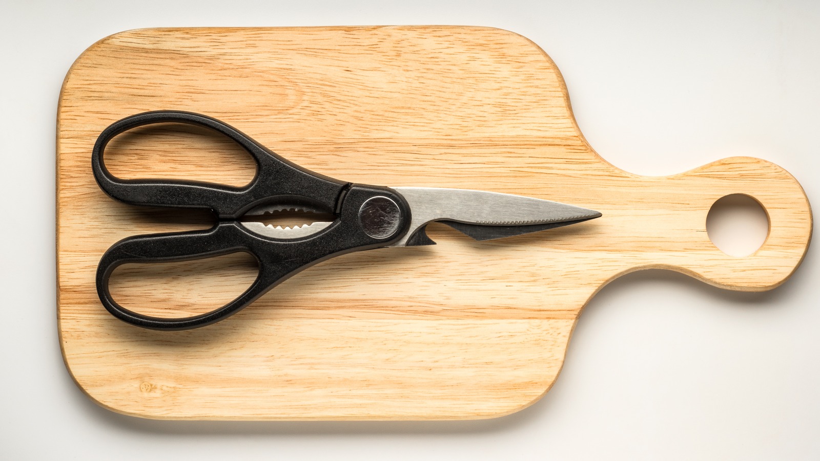 The Kitchen Shear Hack To Open Wine Bottles