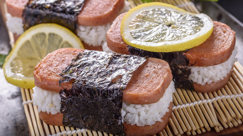SPAM musubi sushi with nori seaweed and lemon slices