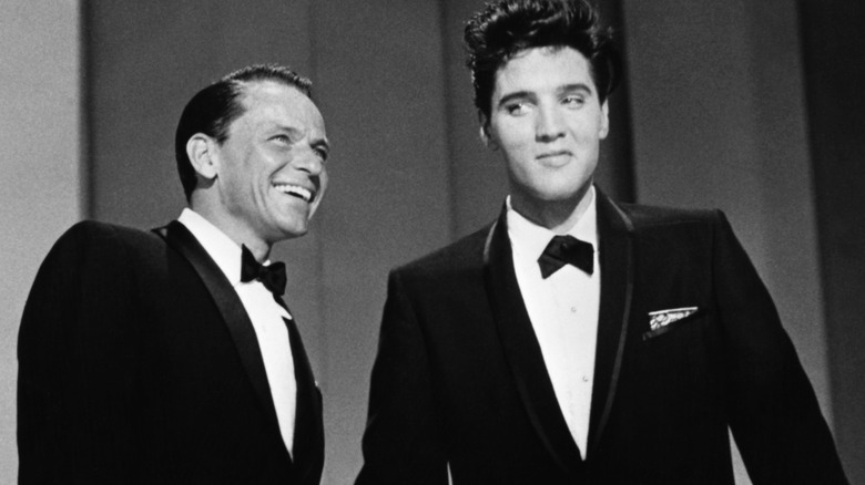 Frank Sinatra and Elvis Presley standing together