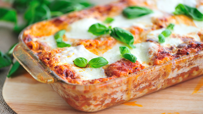 glass dish with lasagna in it