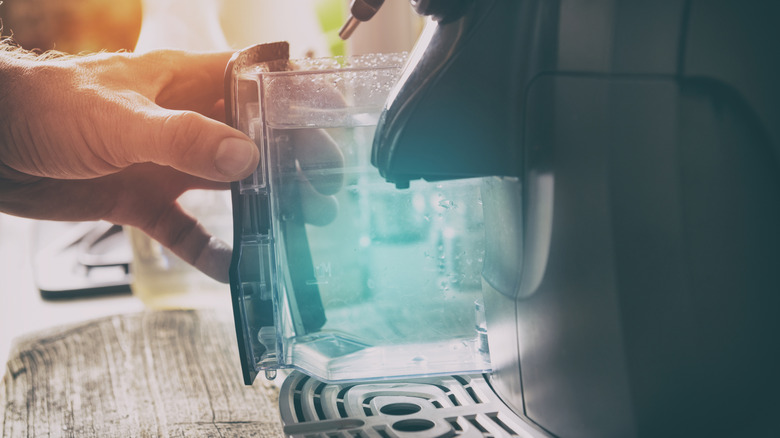 Water reservoir is added into a coffee maker.