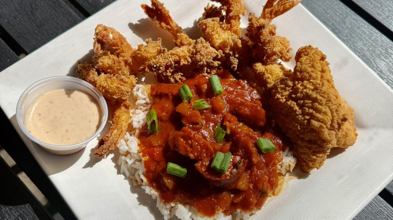 Sausage Creole, fried shrimp, and fried fish from RiverFront﻿ A Louisiana Grill.
