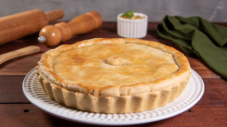 A pot pie on a rustic table