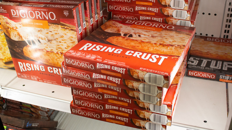 Several boxes of DiGiorno frozen pizzas.