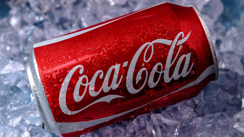 A can of Coca-Cola on ice.