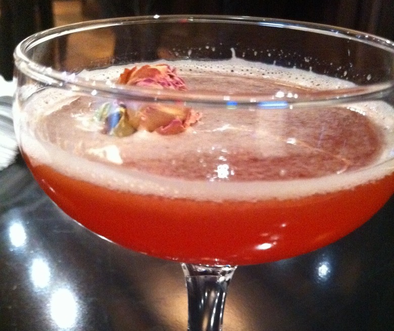 The Mata Hari, an exotic cocktail with chai-infused vermouth, cognac, and pomegranate juice