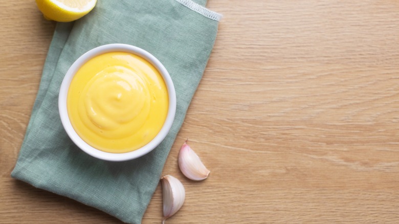 Homemade aioli in white bowl