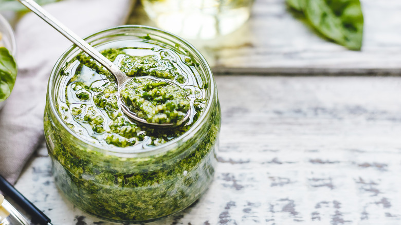 Homemade pesto in glass jar