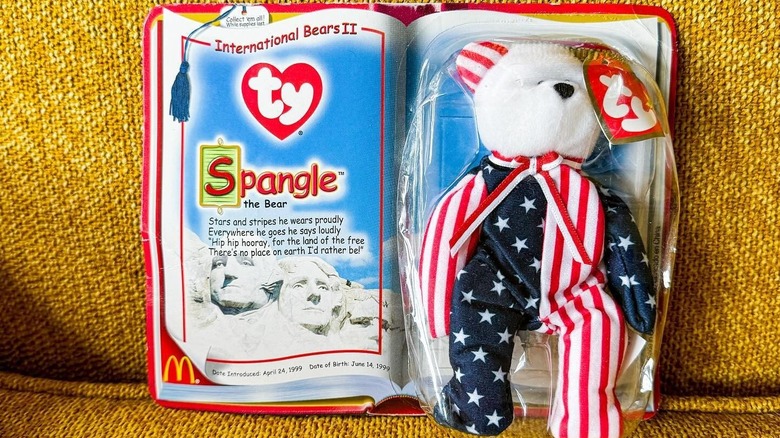 International miniature McDonald's Beanie Baby Spangle the bear on a yellow armchair