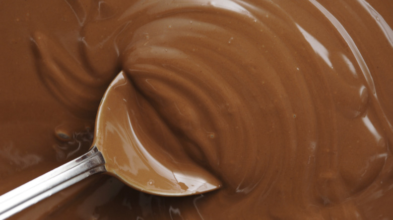 spoon in melted chocolate