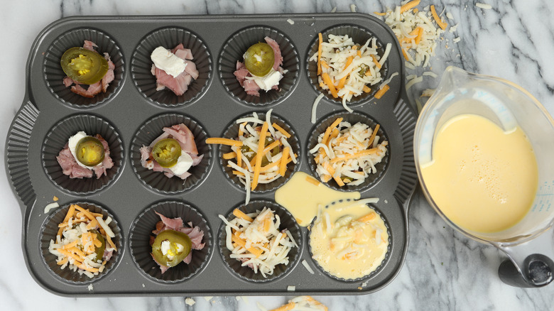 preparing egg bites in muffin tin