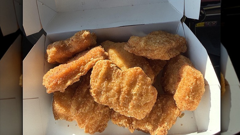 The new Burger King chicken nuggets sit in a paper to-go box
