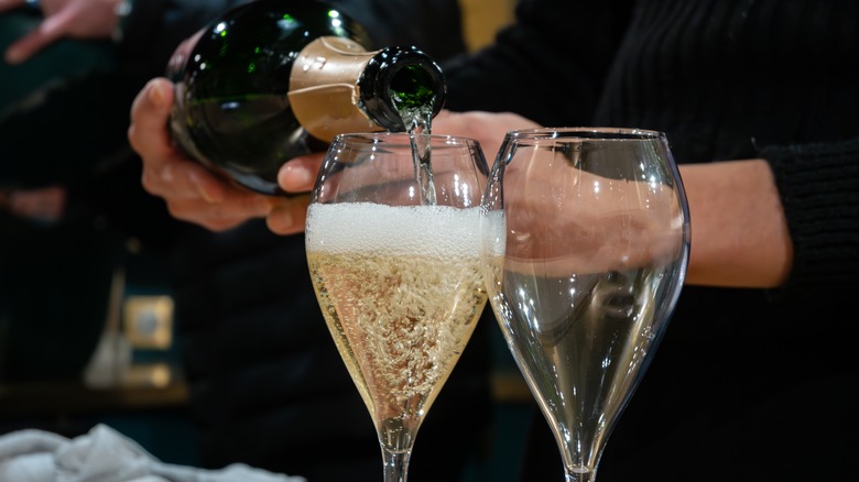 pouring champagne