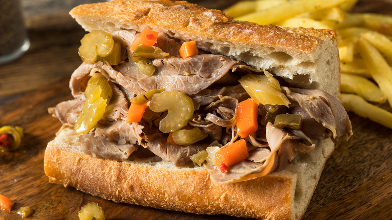 Italian beef sandwich with giardiniera and fries