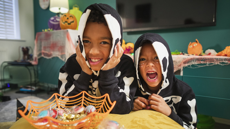 children excited at candy bowl