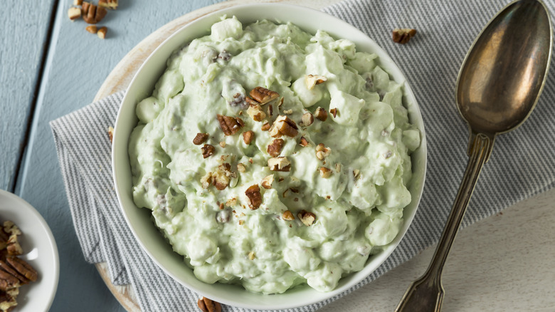 Watergate salad in a bowl with spoon