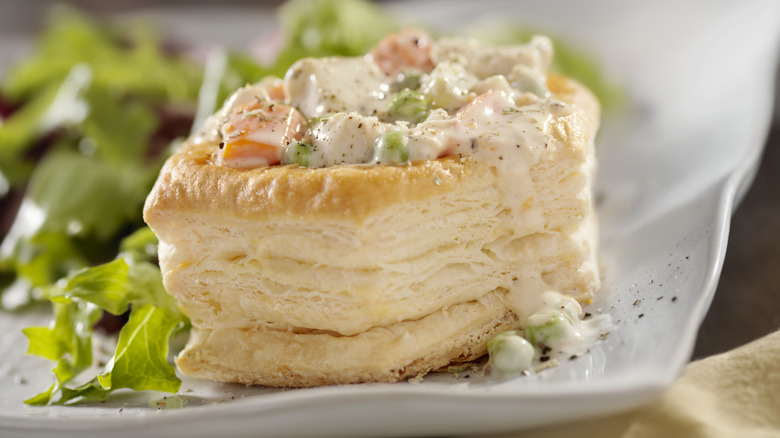 Chicken à la king served in a puff pastry shell