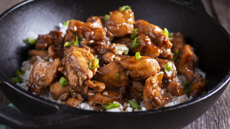 Bourbon chicken over rice.