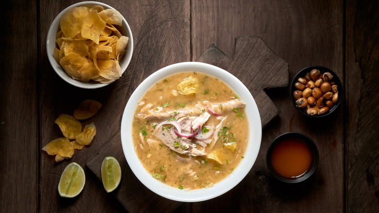 Overhead view of traditional Ecuadorian Encebollado stew with fish and onions