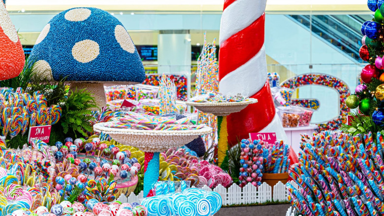 Candyland scene in IT'SUGAR store with lollipop garden