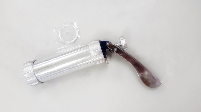 a cookie press on a table