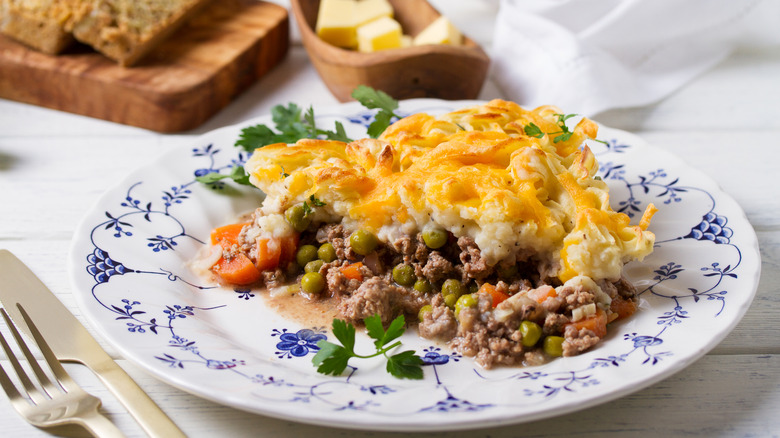 cottage pie plated with herb garnish