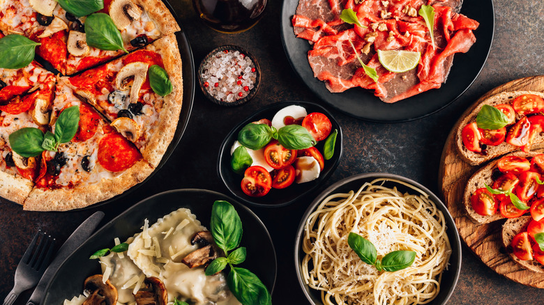 An array of Italian dishes feature fresh basil and high-quality ingredients