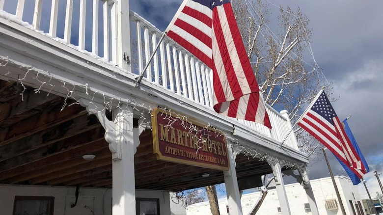Flags adorn the exterior of The Martin Hotel