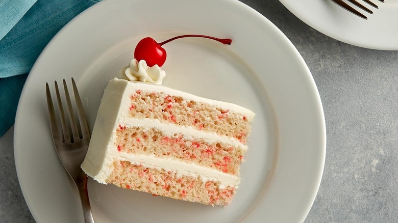 a slice of cake from Betty Crocker Cherry Chip Cake Mix