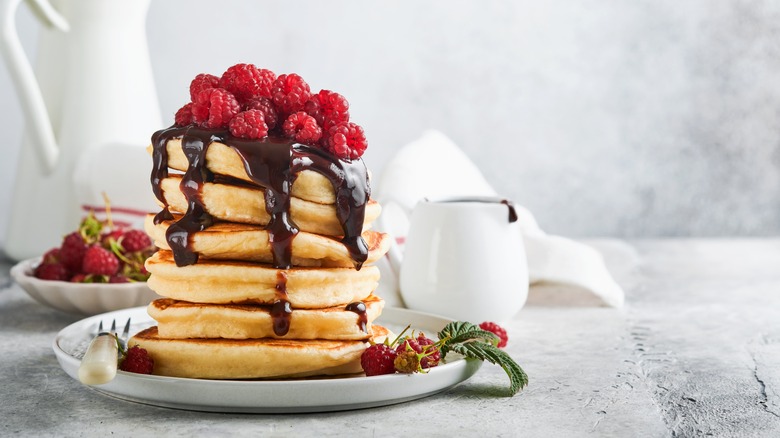 Pancakes topped with raspberries