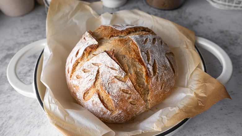 Artisan sourdough loaf on parchment paper