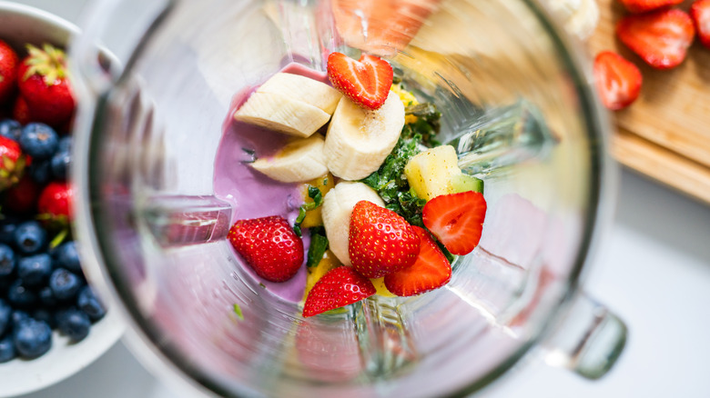 Top down view of fruit in blender