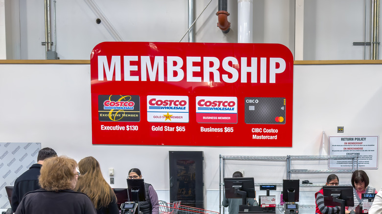 The Membership area of a Costco is busy with customers