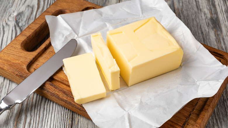 Butter on a chopping board.