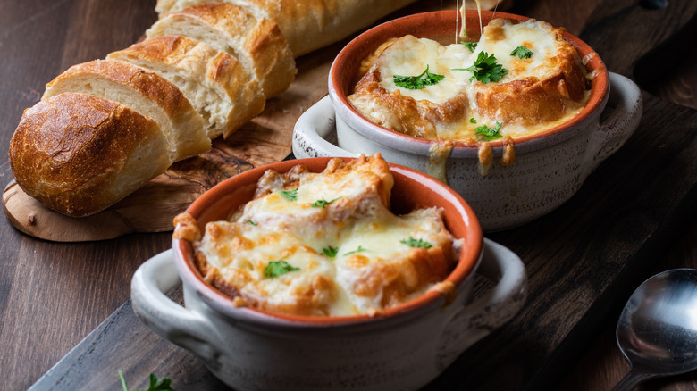 2 crocks of French onion soup with French bread