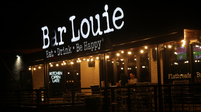 Couple dining late on a Bar Louie patio