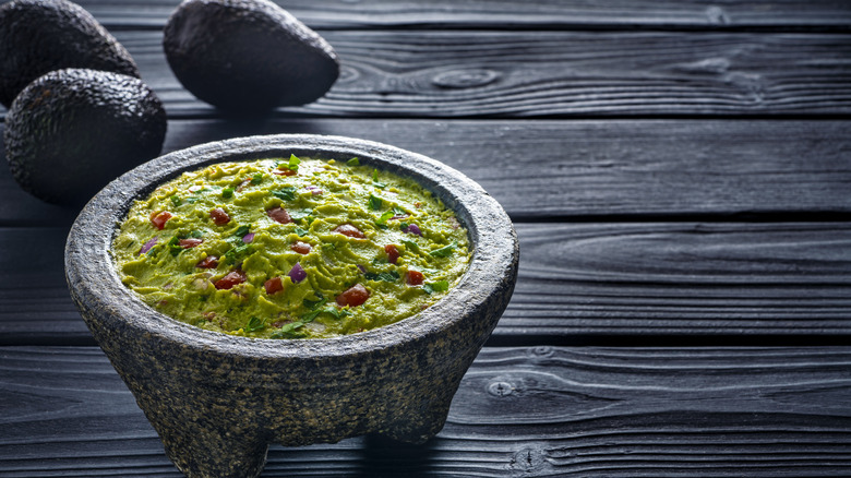 guacamole in a traditional molcajete