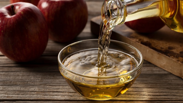 Apple cider vinegar bowl and bottle 