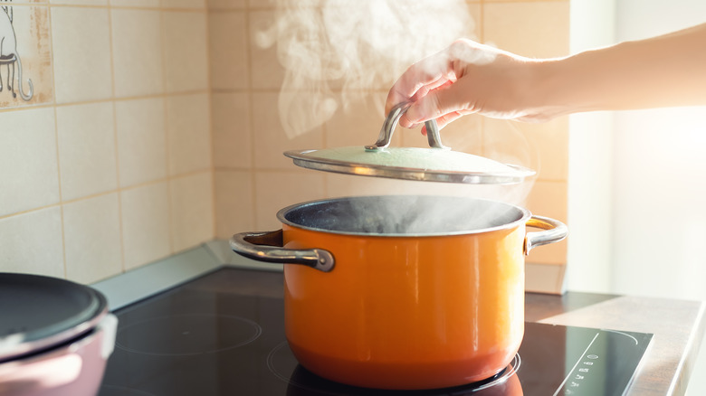 Boil water with lid