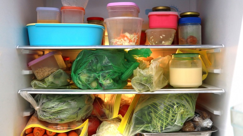 fridge shelves full of food