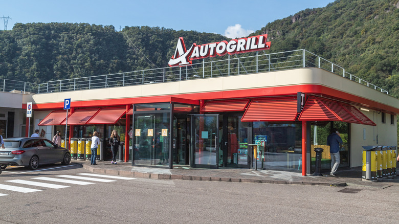 Autogrill storefront in Italy with customers walking out