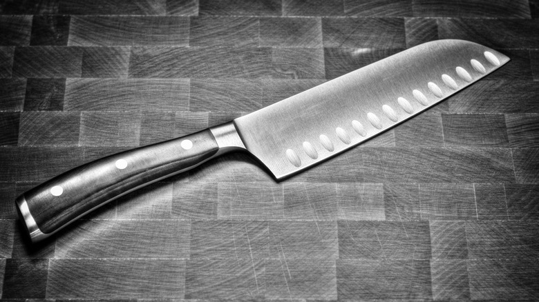 Santoku knife on gray backdrop