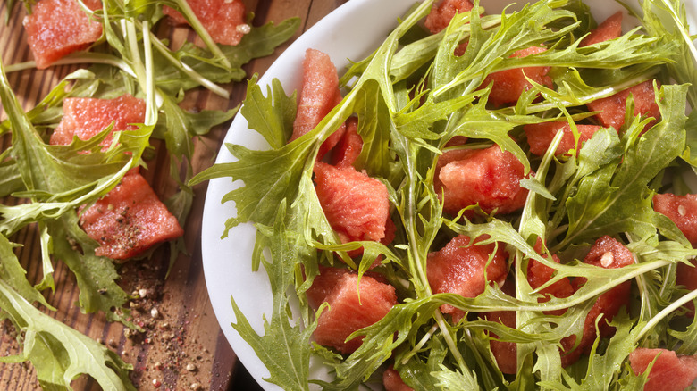 Watermelon in arugula salad 