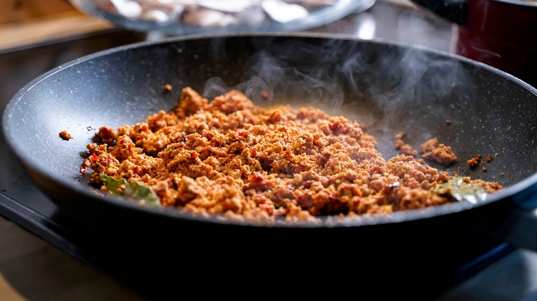 ground beef browning in skillet