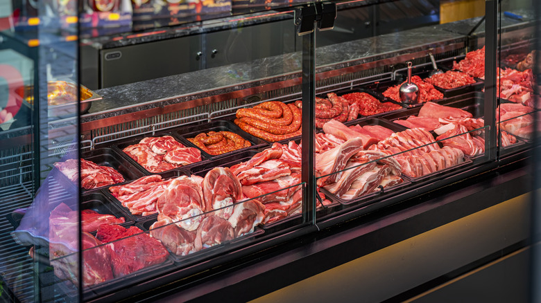 Different cuts of meat at a butcher's counter