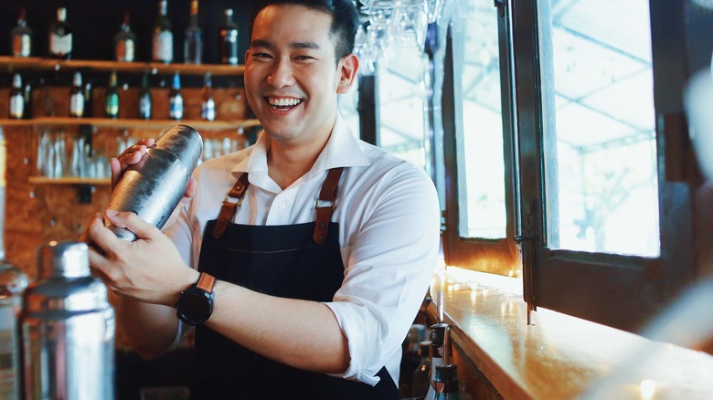 Bartender mixing drink
