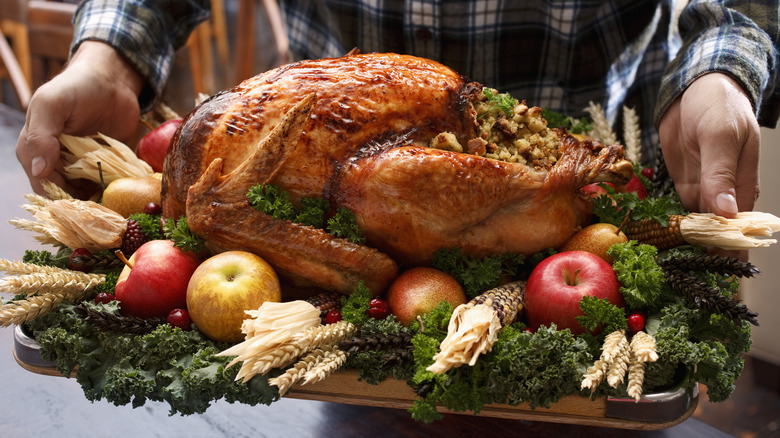 Roasted turkey on platter 