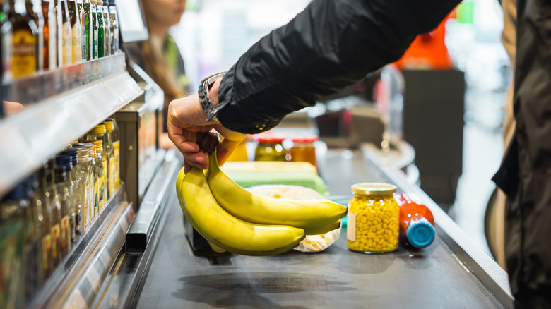 Person buying groceries