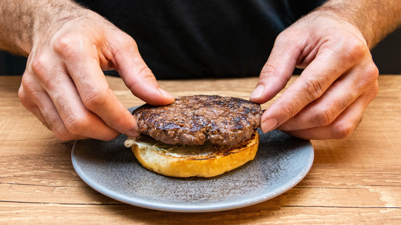 chef preparing burger